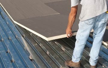 benefits of insulating Broadgrass Green flat roofing
